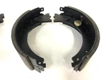 Dexter Trailer Axle Left Hand Electric Brake Shoe Set K71-051-00 Nos 12 1/4". Fixed Price $250.00.